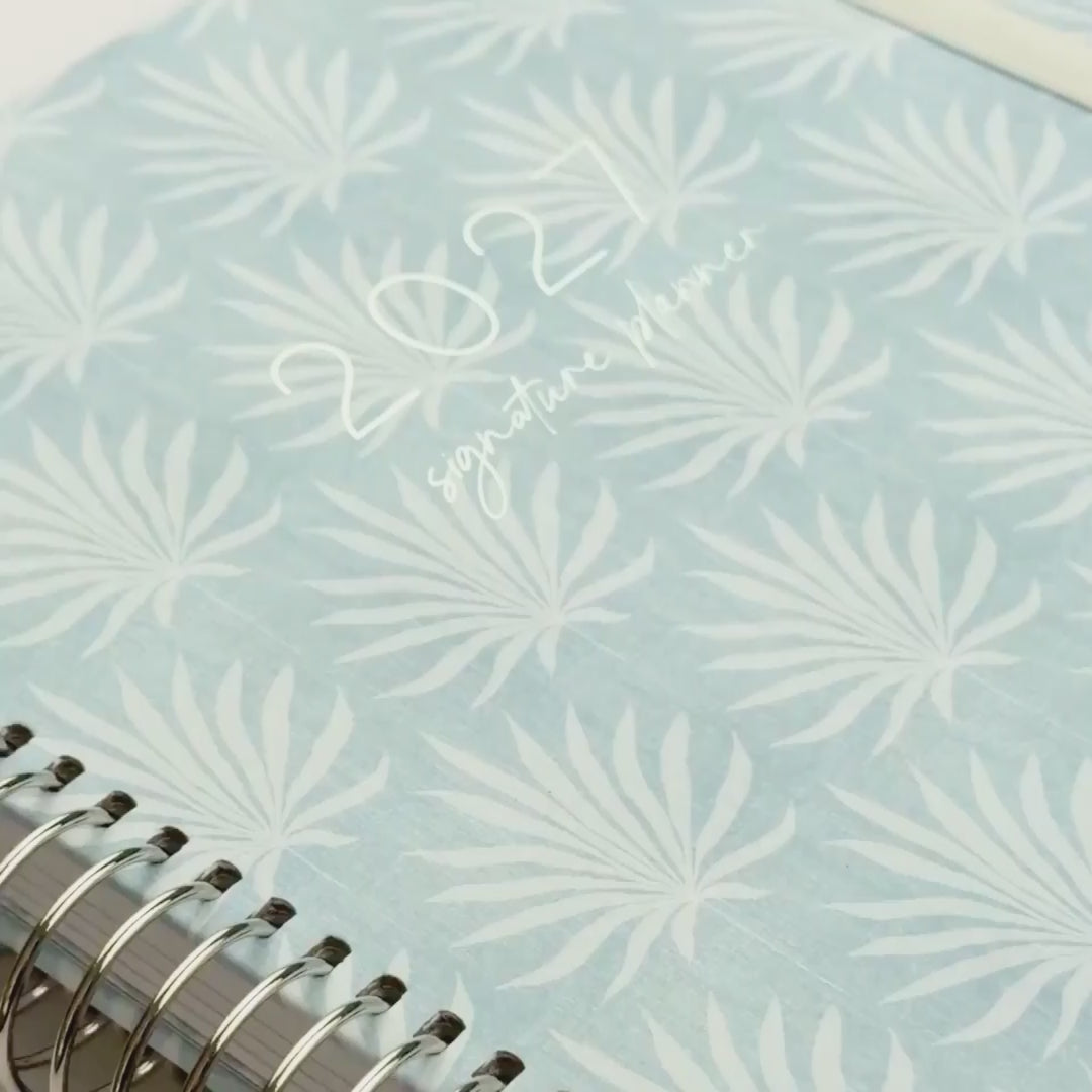 video of 2027 teacher planner Palms showing off colour, design and artwork