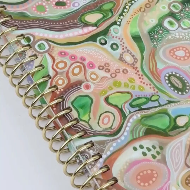 video showing off the notebook 'Sacred Grandparent Tree' beautiful design