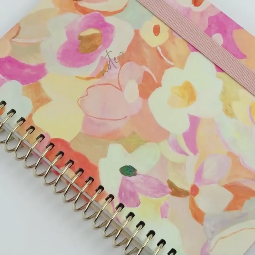 notebook showing off the notebook 'Love Fool', showing the inside and outside of the notebook 