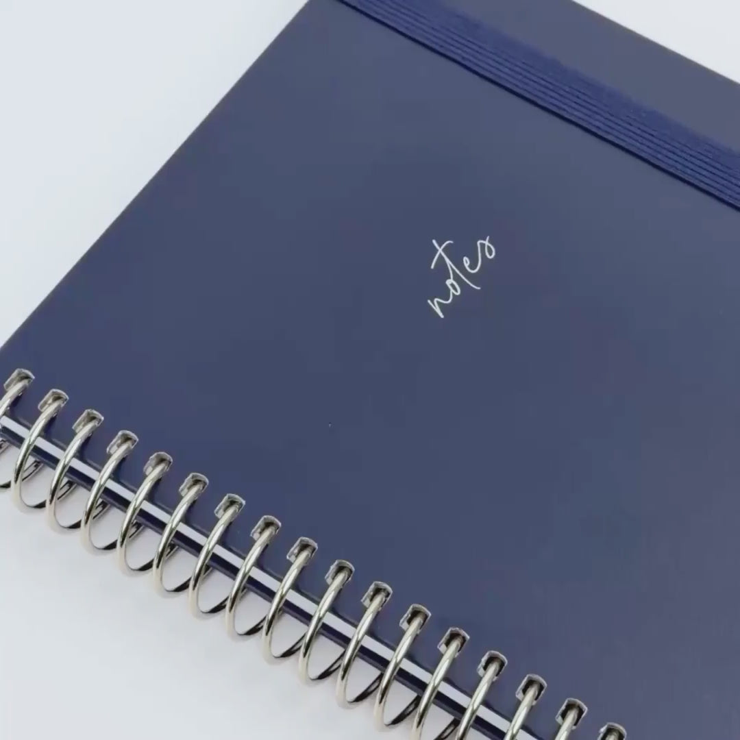 video of Notebook Midnight, dark blue elastic and sliver binding 