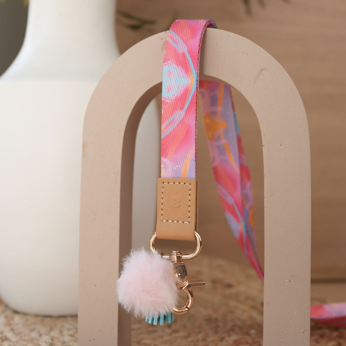 Solar Glow teacher lanyard by Rowena Martinich full length, gold clasp, baby pink pom pom and sky blue tassel