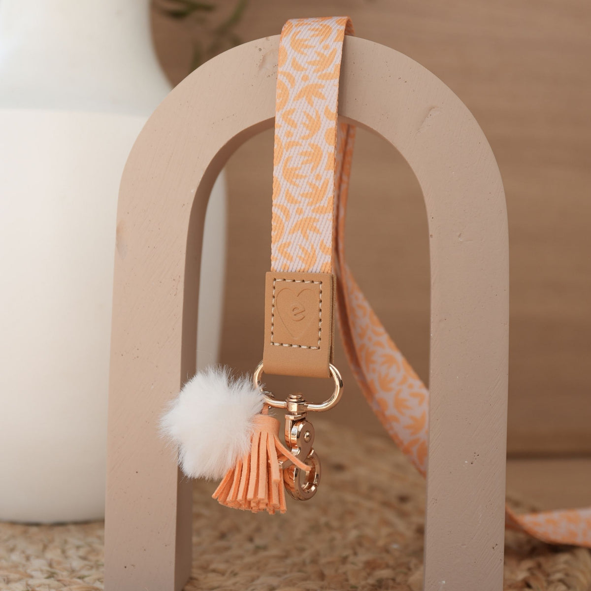 Sunburst Golden teacher lanyard by Cass Deller full length, gold clasp, white pom pom and orange tassel