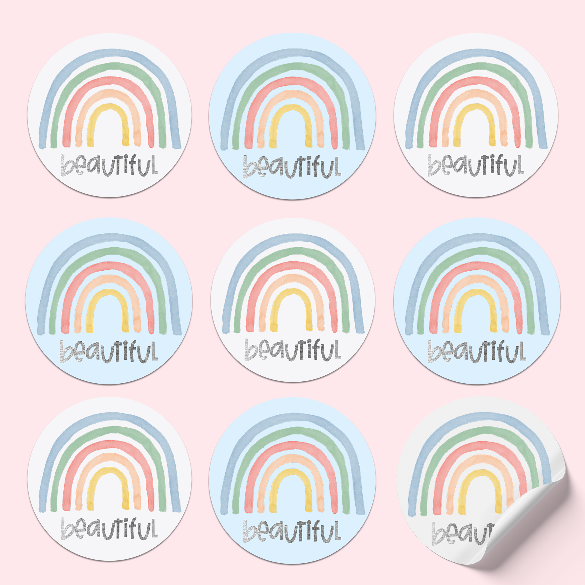3x3 sticker sheet featuring rainbows with silver foil text saying 'Beautiful.' The sticker backgrounds alternate between white and blue.