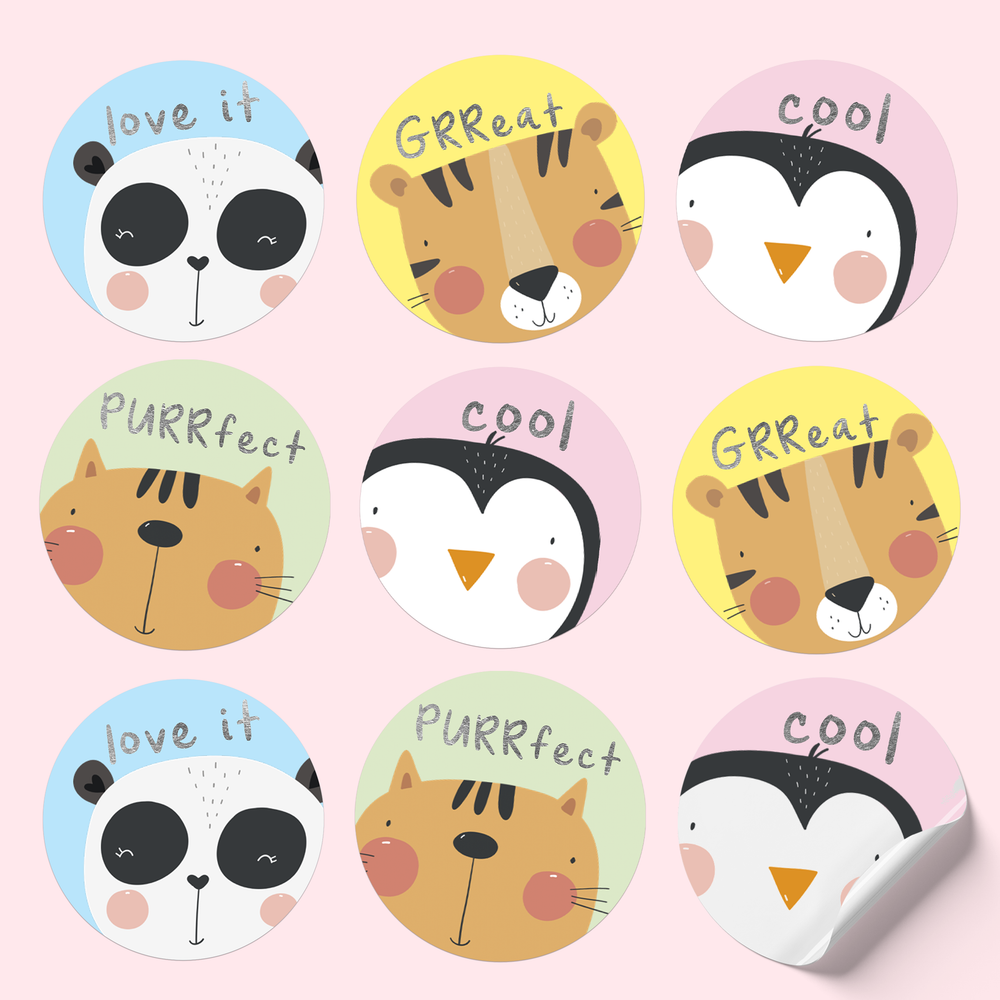 Sticker sheet with three rows of stickers featuring pandas, cats, tigers, and penguins. Silver-foiled text reads 'Love it', 'Grreat', 'Cool', and 'Purrfect' on pastel backgrounds.