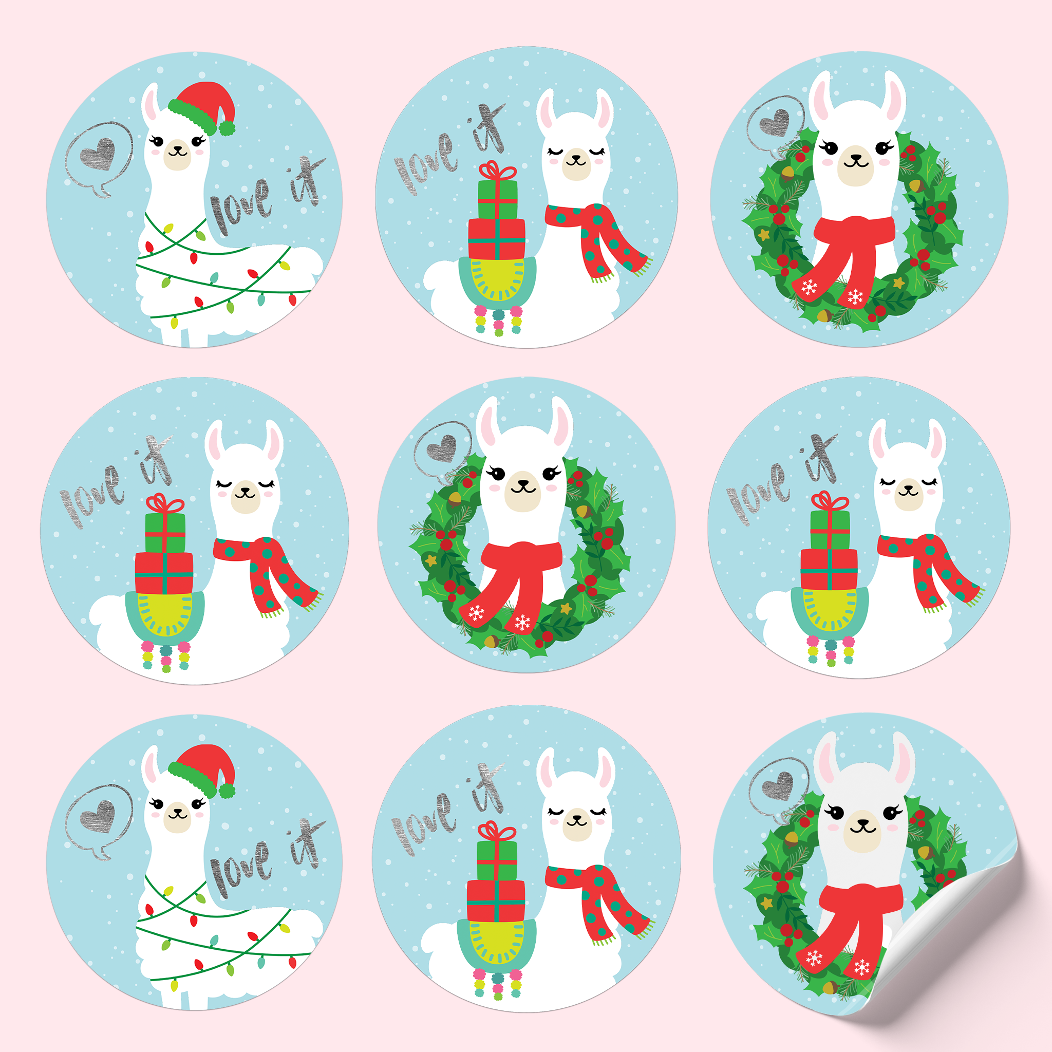 Sticker sheet featuring a happy white alpaca in a scarf and Christmas hat, with decorations. The blue background has snowflakes and silver foiled text saying 'Love it!' with silver foiled hearts.
