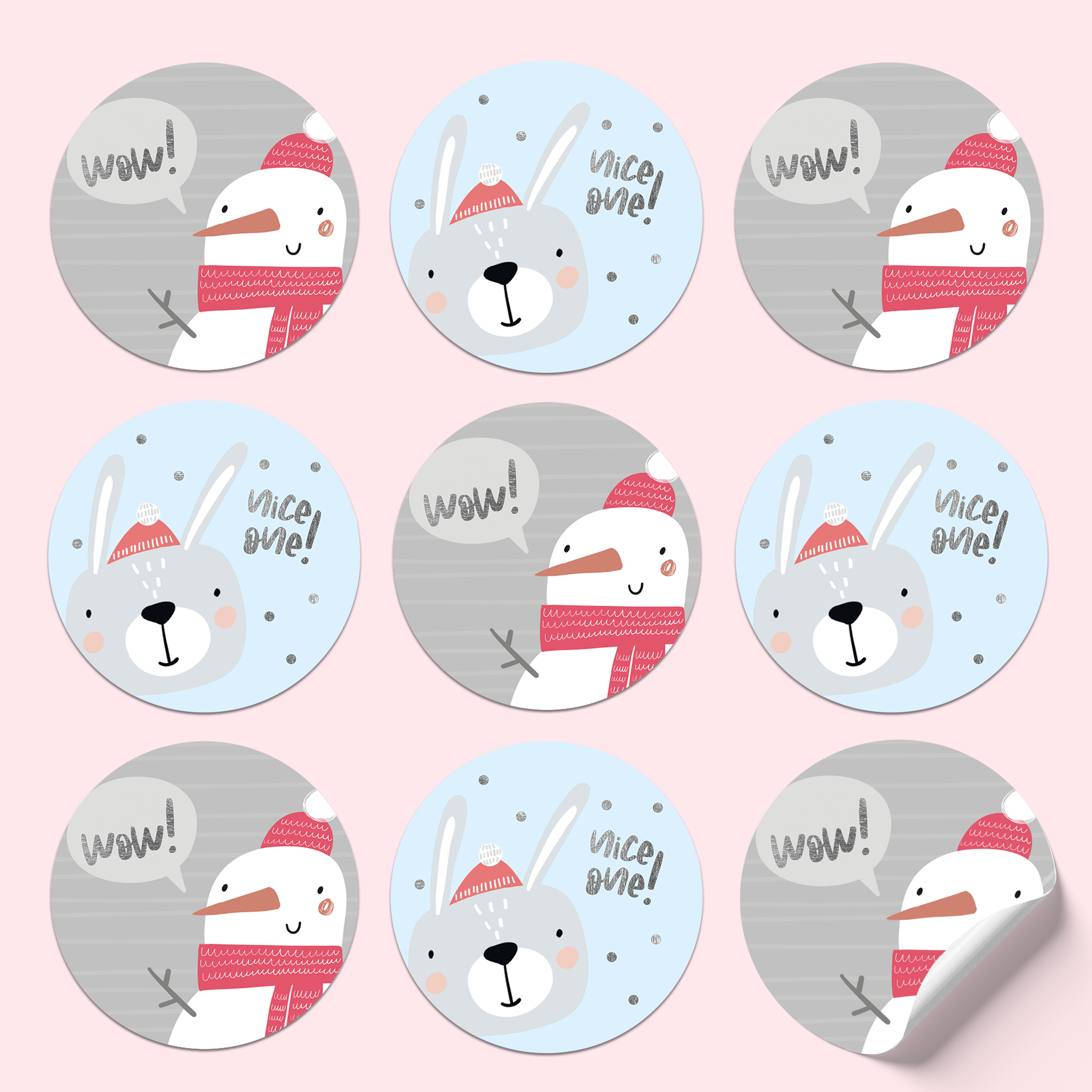 Sticker sheet with snowman on grey background with 'Wow!' in silver foil, and rabbit in Christmas gear on blue background with 'Nice one!'